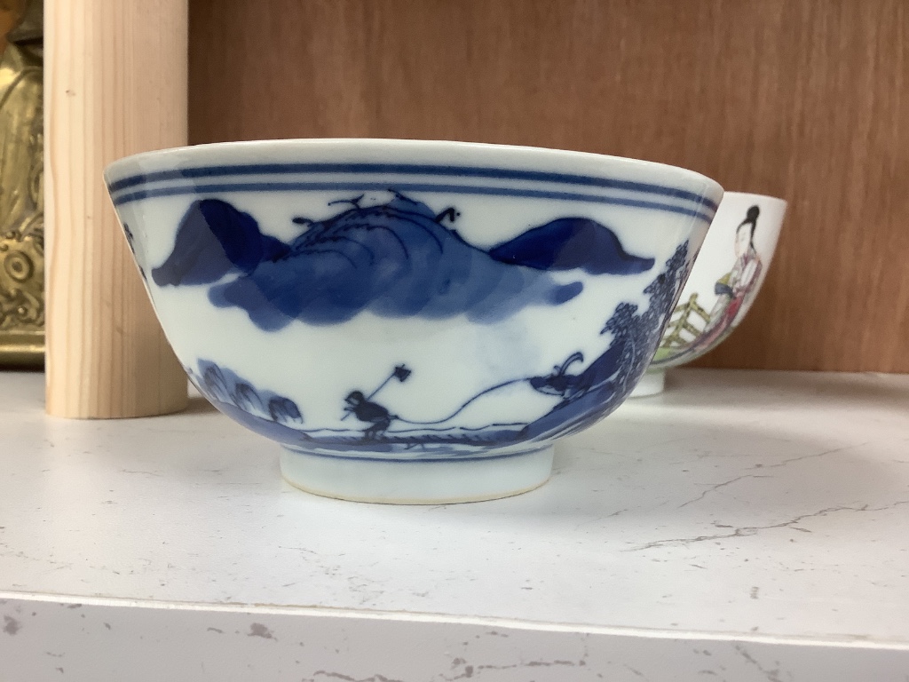 A Chinese blue and white footed porcelain bowl, Kangxi mark to underside, c1900, 12cm diameter 6cm high, together with a further hand painted famille rose, 15cm diameter, 7cm high